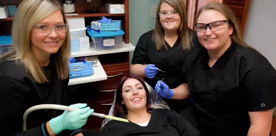 students training dental procedures in class